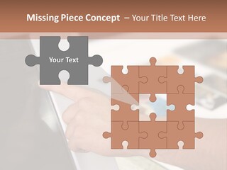 A Person Pointing At A Computer Screen On A Desk PowerPoint Template