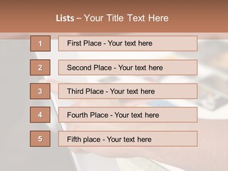 A Person Pointing At A Computer Screen On A Desk PowerPoint Template