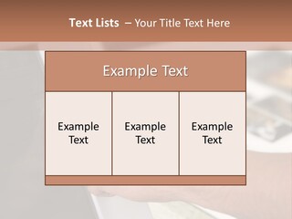 A Person Pointing At A Computer Screen On A Desk PowerPoint Template