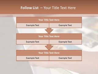 A Person Pointing At A Computer Screen On A Desk PowerPoint Template