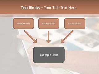 A Person Pointing At A Computer Screen On A Desk PowerPoint Template