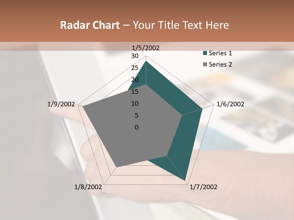 A Person Pointing At A Computer Screen On A Desk PowerPoint Template