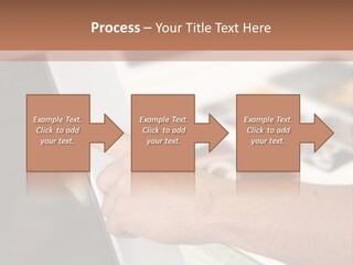 A Person Pointing At A Computer Screen On A Desk PowerPoint Template