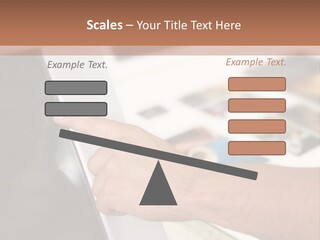 A Person Pointing At A Computer Screen On A Desk PowerPoint Template