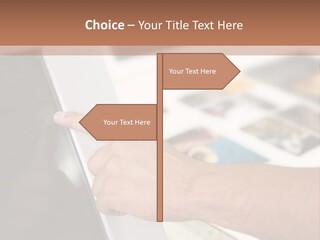 A Person Pointing At A Computer Screen On A Desk PowerPoint Template