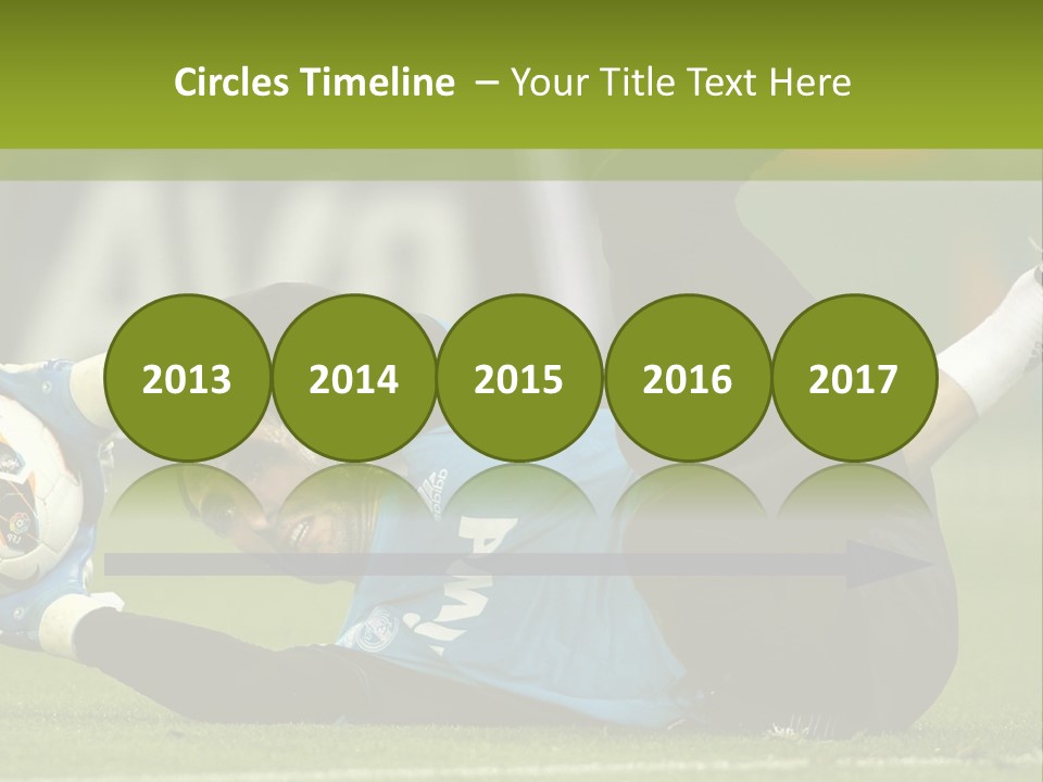 A Man Laying On The Ground With A Soccer Ball PowerPoint Template