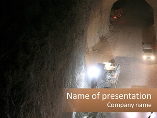 A Car Driving Through A Tunnel In The Dark PowerPoint Template