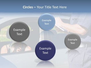 A Woman Sitting In A Car Talking To A Man PowerPoint Template