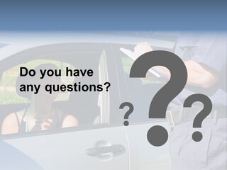 A Woman Sitting In A Car Talking To A Man PowerPoint Template