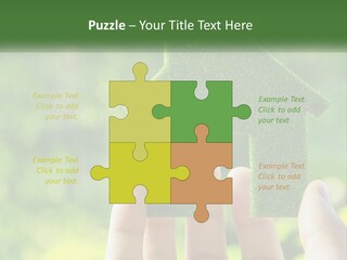 A Person Holding A Small Green House In Their Hands PowerPoint Template