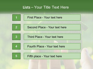 A Person Holding A Small Green House In Their Hands PowerPoint Template