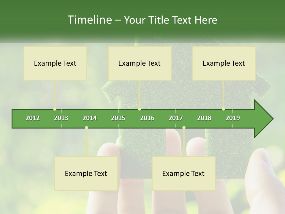 A Person Holding A Small Green House In Their Hands PowerPoint Template