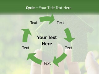 A Person Holding A Small Green House In Their Hands PowerPoint Template