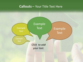 A Person Holding A Small Green House In Their Hands PowerPoint Template