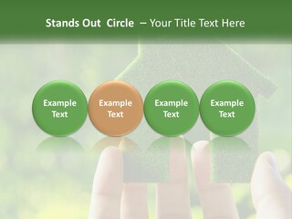 A Person Holding A Small Green House In Their Hands PowerPoint Template