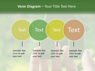 A Person Holding A Small Green House In Their Hands PowerPoint Template