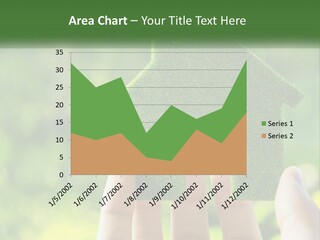 A Person Holding A Small Green House In Their Hands PowerPoint Template