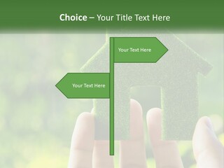 A Person Holding A Small Green House In Their Hands PowerPoint Template