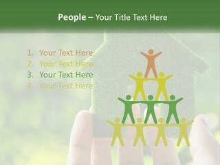 A Person Holding A Small Green House In Their Hands PowerPoint Template