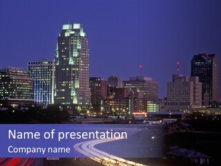 A City Skyline At Night With A Blue Sky PowerPoint Template