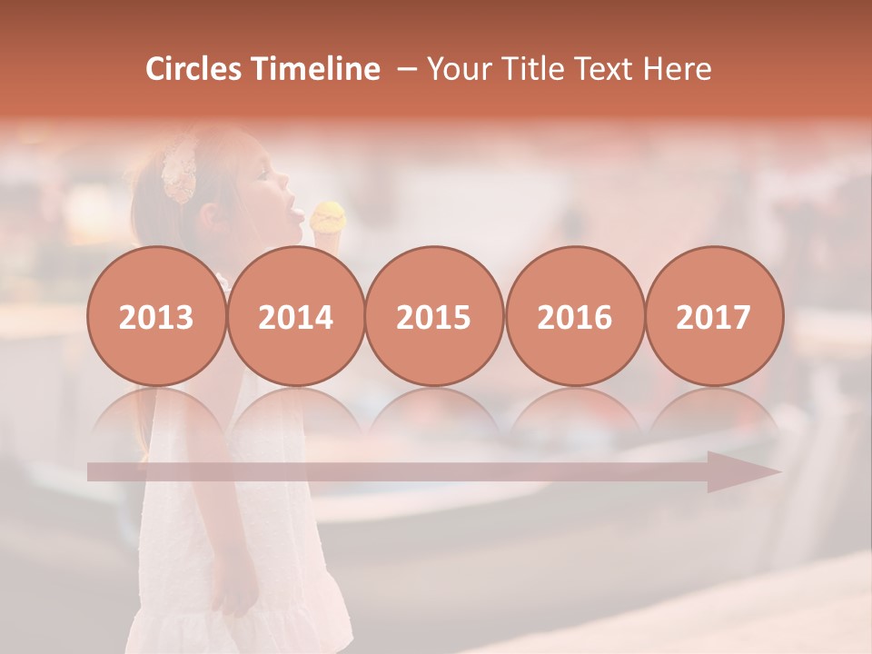 A Little Girl Is Eating An Ice Cream Cone PowerPoint Template