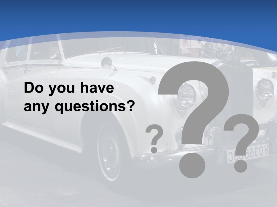 A White Car Is On Display In A Showroom PowerPoint Template