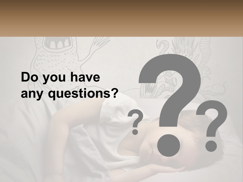 A Young Boy Sleeping On A Bed With A Monster Drawn On The Wall Behind Him PowerPoint Template