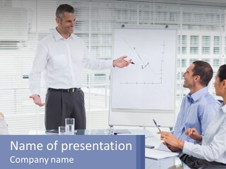 A Man Giving A Presentation To A Group Of People PowerPoint Template