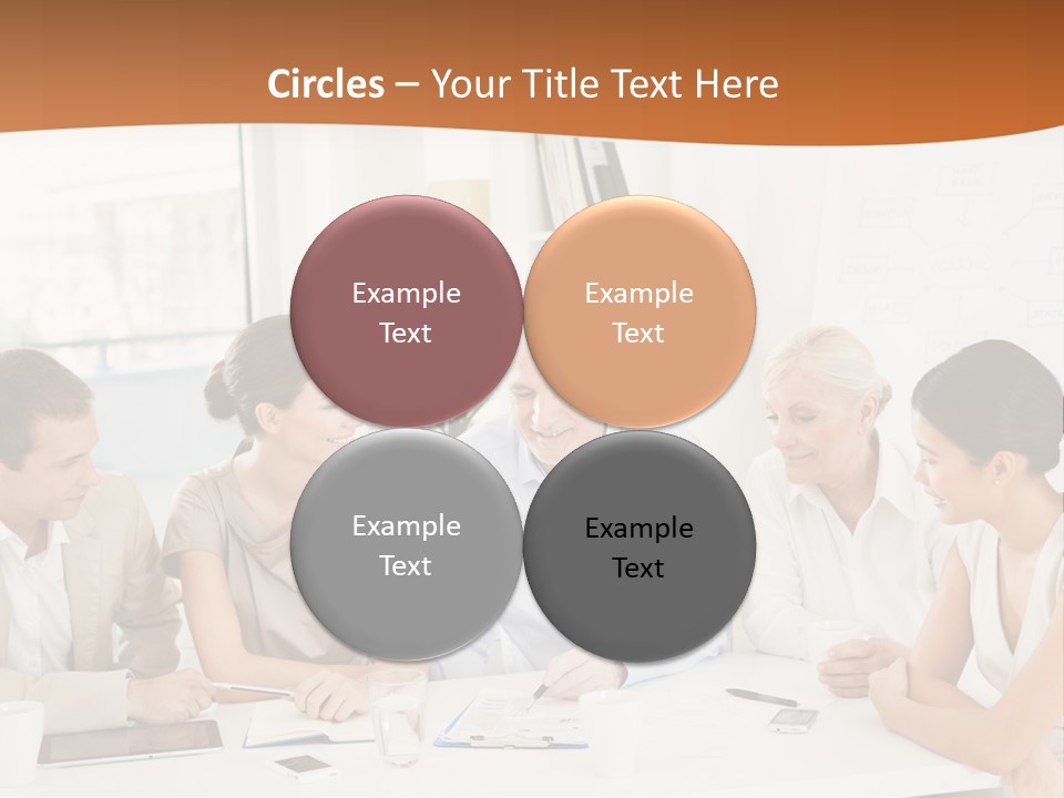 A Group Of People Sitting Around A Table PowerPoint Template