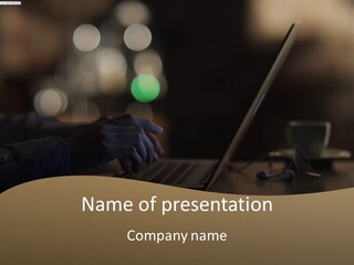 A Person Typing On A Laptop On A Table PowerPoint Template