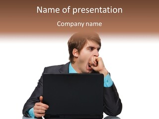 A Man In A Suit Is Using A Laptop PowerPoint Template