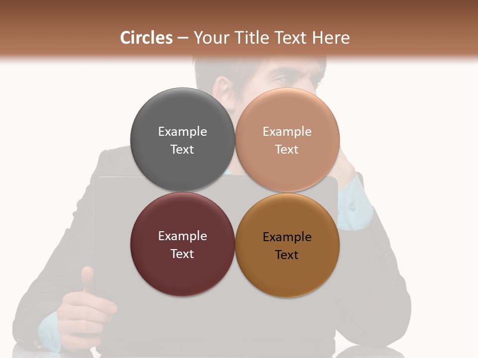 A Man In A Suit Is Using A Laptop PowerPoint Template