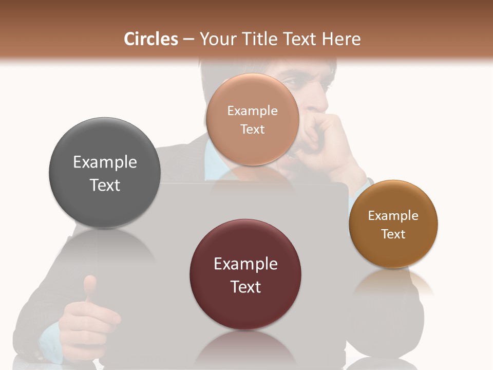 A Man In A Suit Is Using A Laptop PowerPoint Template