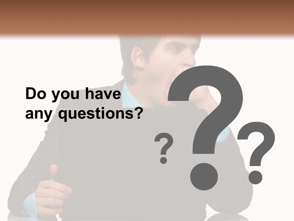 A Man In A Suit Is Using A Laptop PowerPoint Template