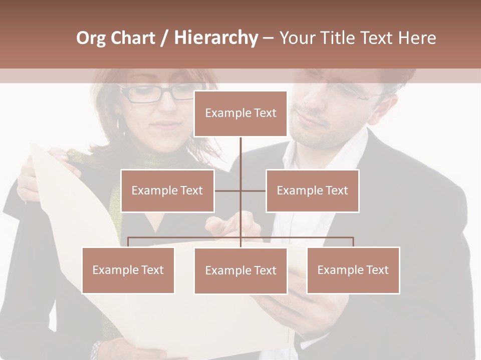 A Man And Woman Looking At A Piece Of Paper PowerPoint Template