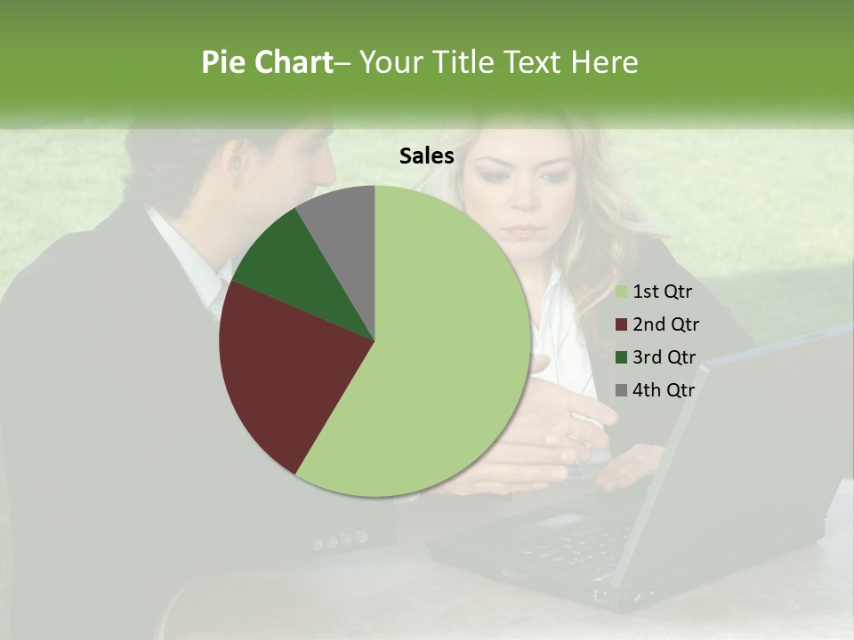 A Man And Woman Sitting At A Table Looking At A Laptop PowerPoint Template