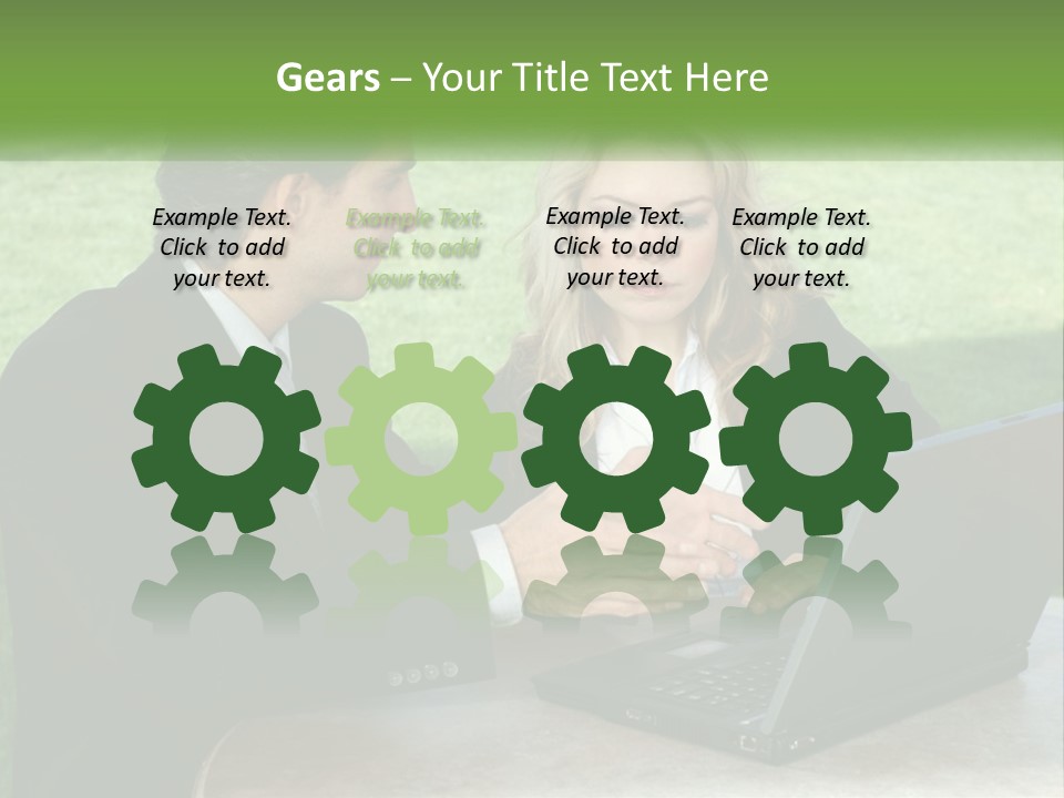 A Man And Woman Sitting At A Table Looking At A Laptop PowerPoint Template