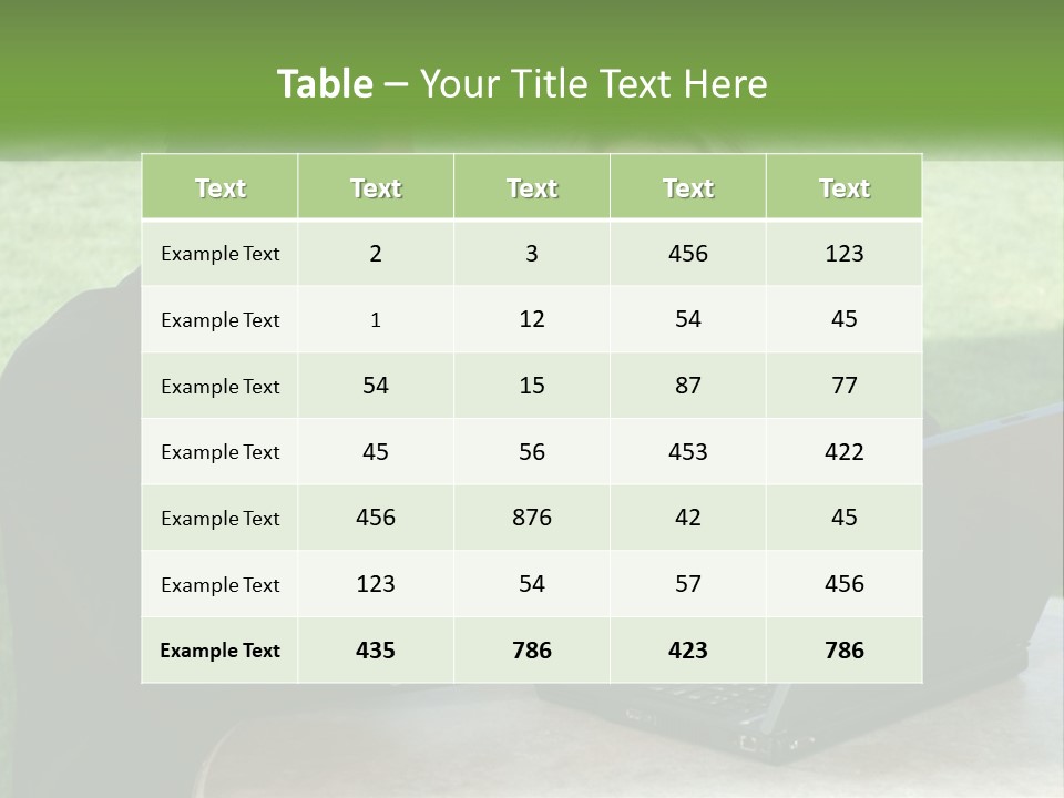 A Man And Woman Sitting At A Table Looking At A Laptop PowerPoint Template