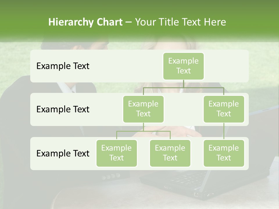 A Man And Woman Sitting At A Table Looking At A Laptop PowerPoint Template