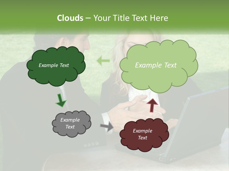 A Man And Woman Sitting At A Table Looking At A Laptop PowerPoint Template