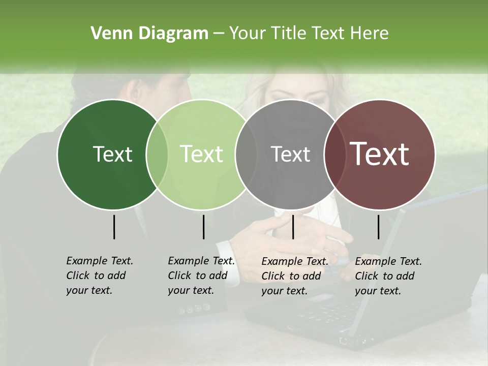A Man And Woman Sitting At A Table Looking At A Laptop PowerPoint Template