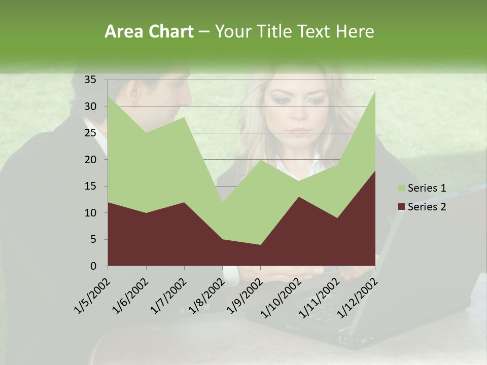 A Man And Woman Sitting At A Table Looking At A Laptop PowerPoint Template