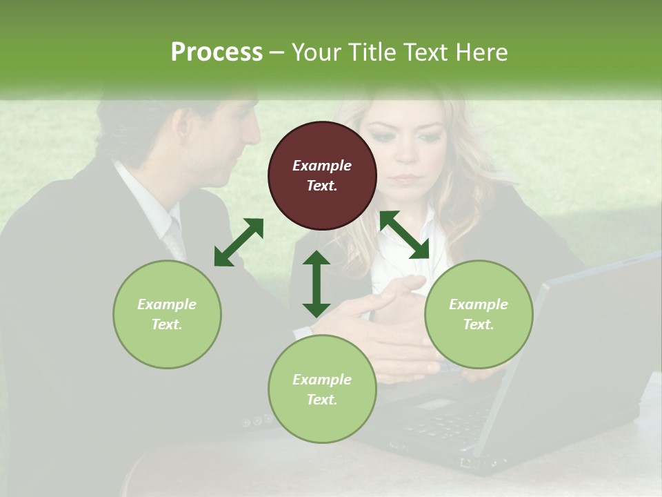 A Man And Woman Sitting At A Table Looking At A Laptop PowerPoint Template
