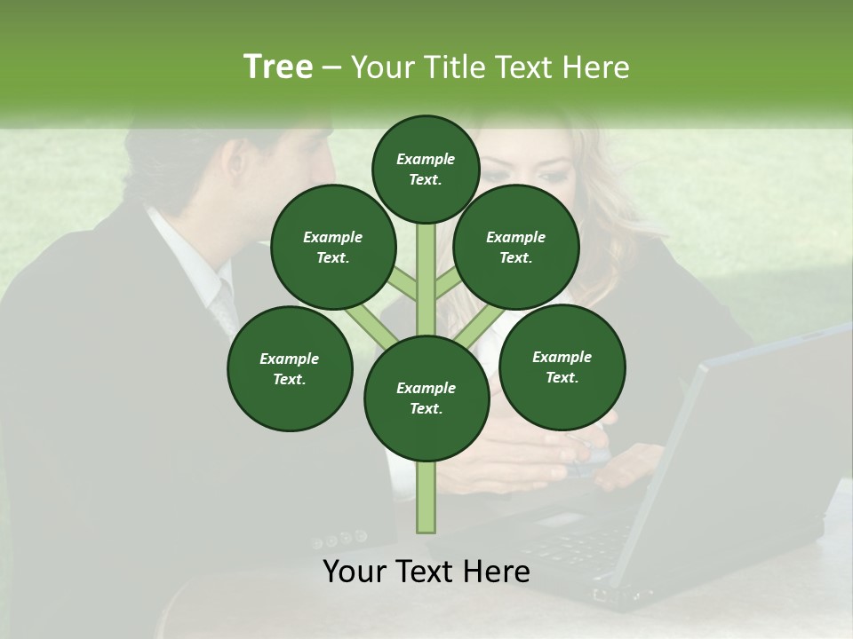 A Man And Woman Sitting At A Table Looking At A Laptop PowerPoint Template