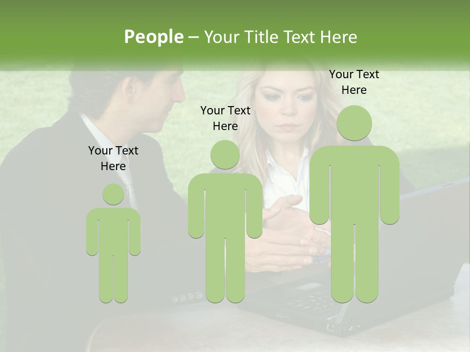 A Man And Woman Sitting At A Table Looking At A Laptop PowerPoint Template