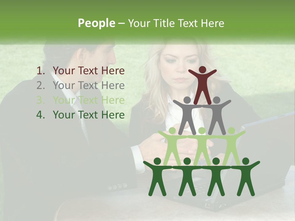 A Man And Woman Sitting At A Table Looking At A Laptop PowerPoint Template