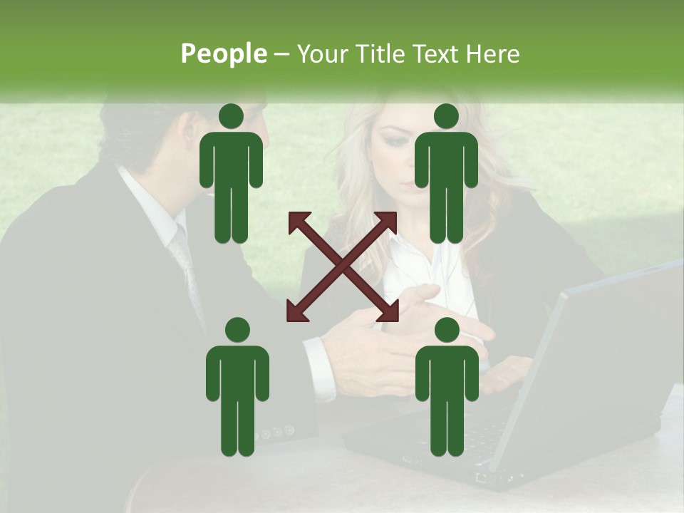 A Man And Woman Sitting At A Table Looking At A Laptop PowerPoint Template