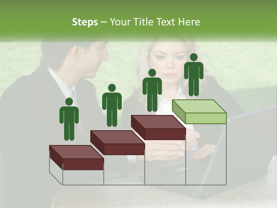 A Man And Woman Sitting At A Table Looking At A Laptop PowerPoint Template