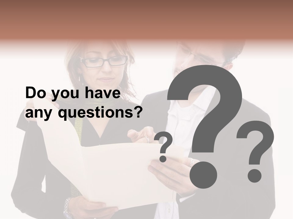 A Man And Woman Looking At A Piece Of Paper PowerPoint Template