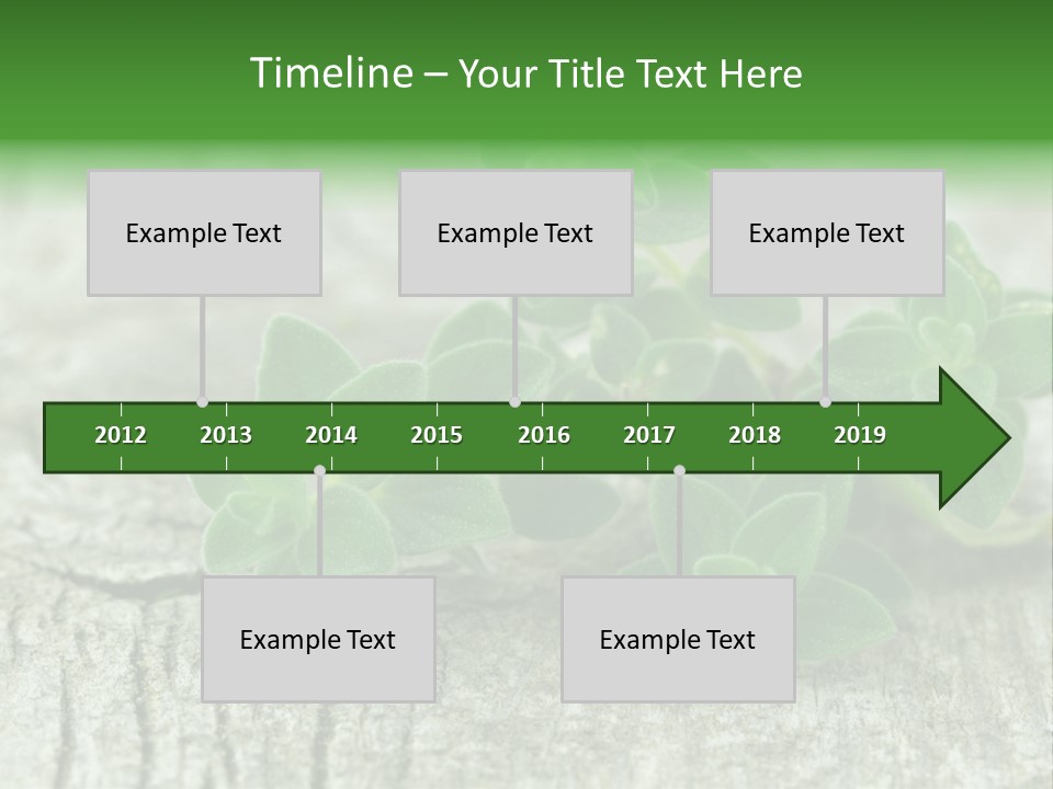 A Bunch Of Green Leaves Sitting On Top Of A Wooden Table PowerPoint Template